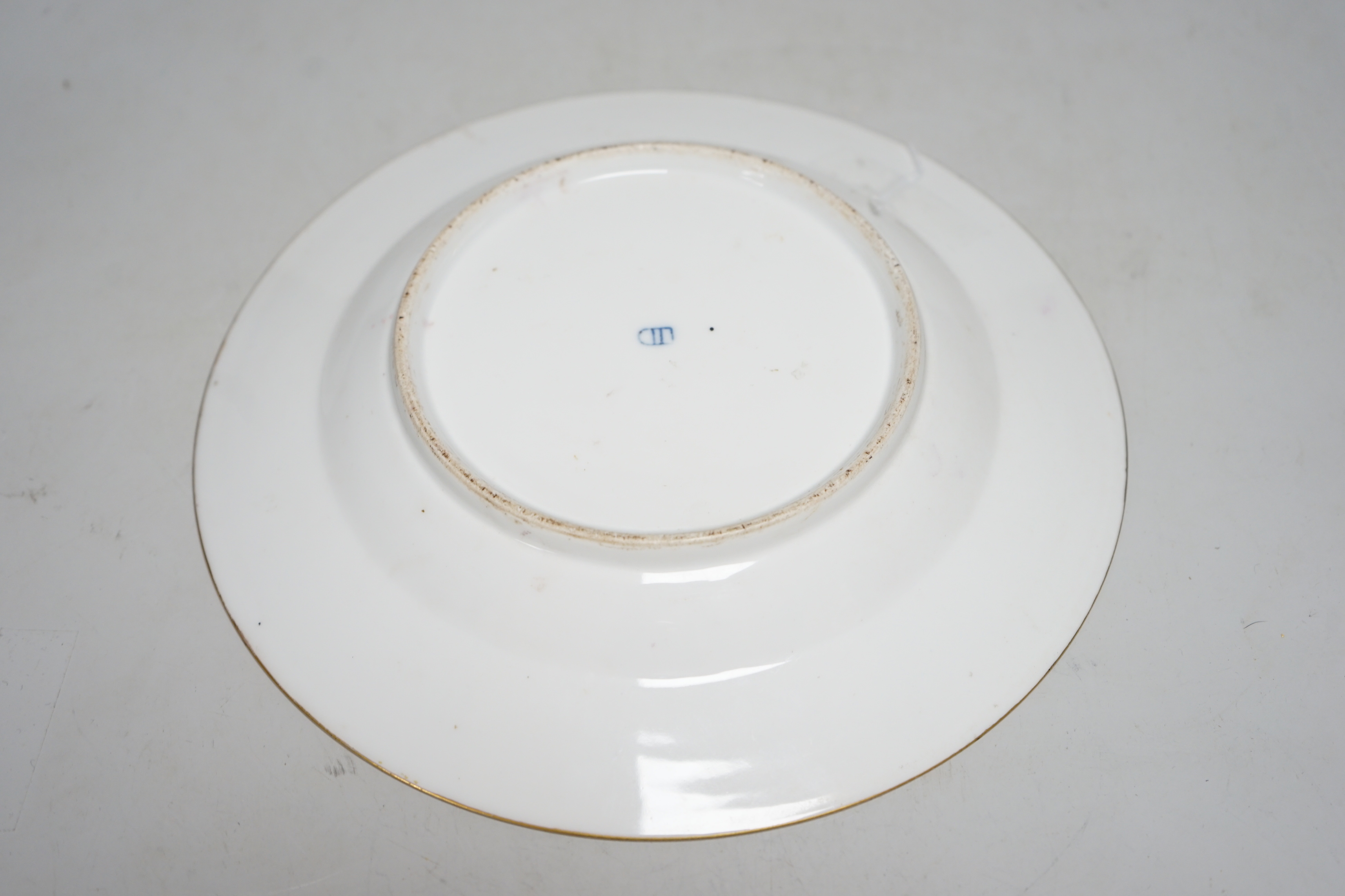 A late 19th century Vienna plate, with shield to reverse, 24cm